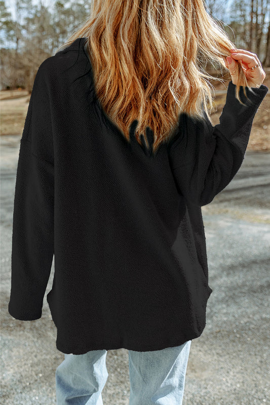 Chaqueta relajada con bolsillos de solapa en contraste de color negro