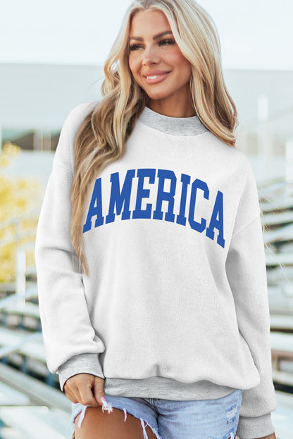 Sudadera gris claro con cuello simulado y gráfico reversible de EE. UU./América