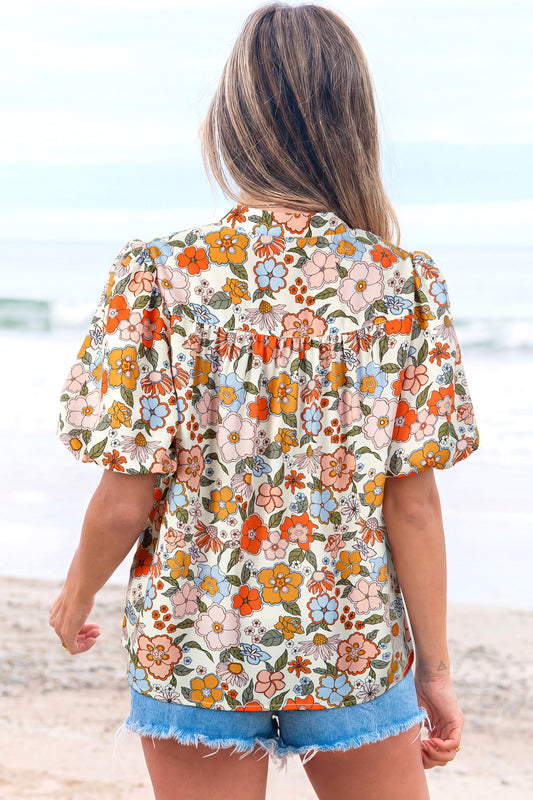Blusa bohemia con cuello en V, mangas abullonadas y flores de ganchillo multicolor