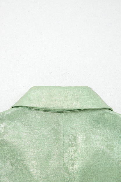 Top metálico de manga tres cuartos con cuello en V en color Aqua
