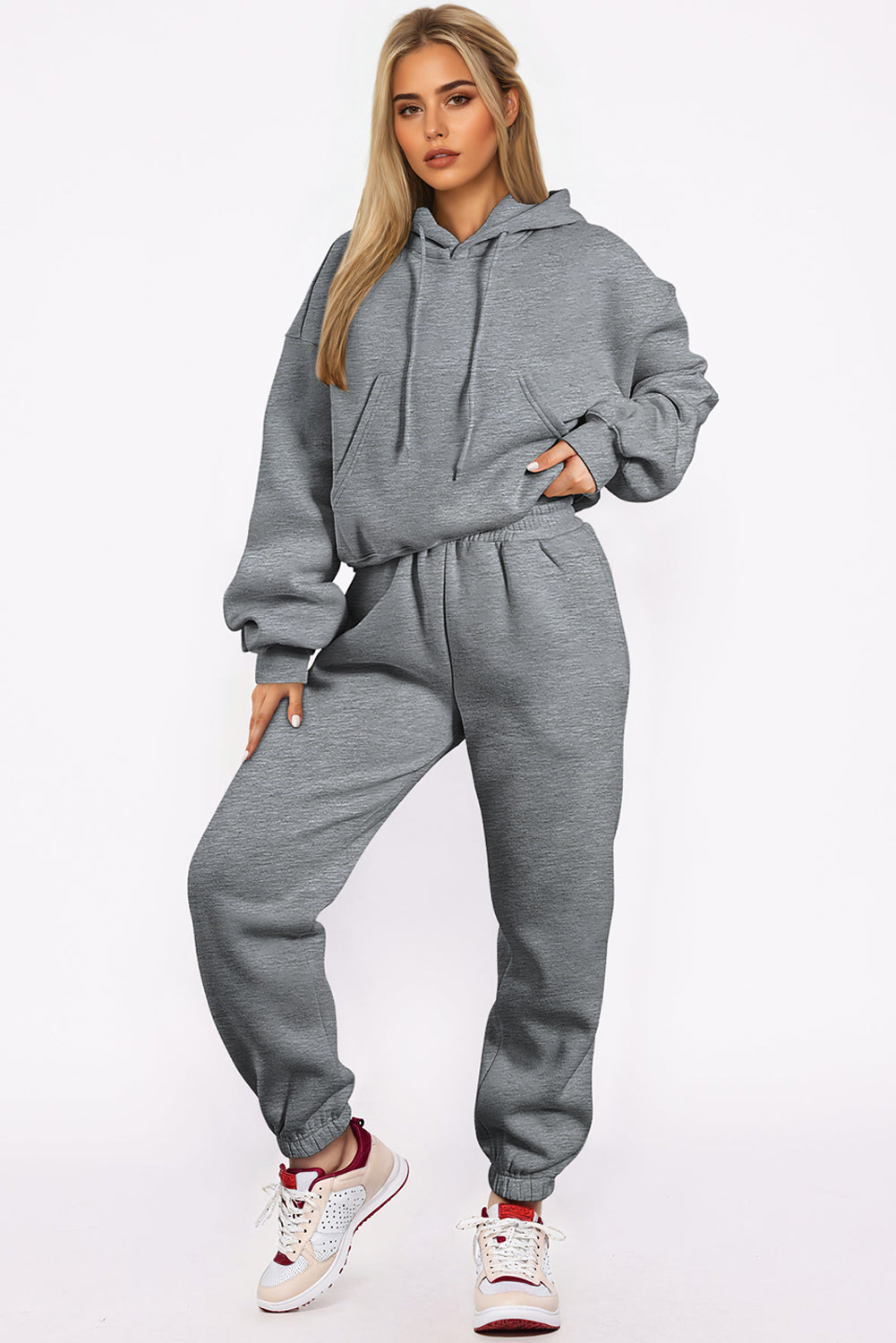Conjunto deportivo de sudadera con capucha de hombros caídos y joggers, color gris liso