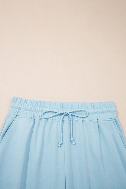Conjunto de 2 piezas de top de manga corta con ribete acanalado color azul bruma y pantalones holgados con cordón