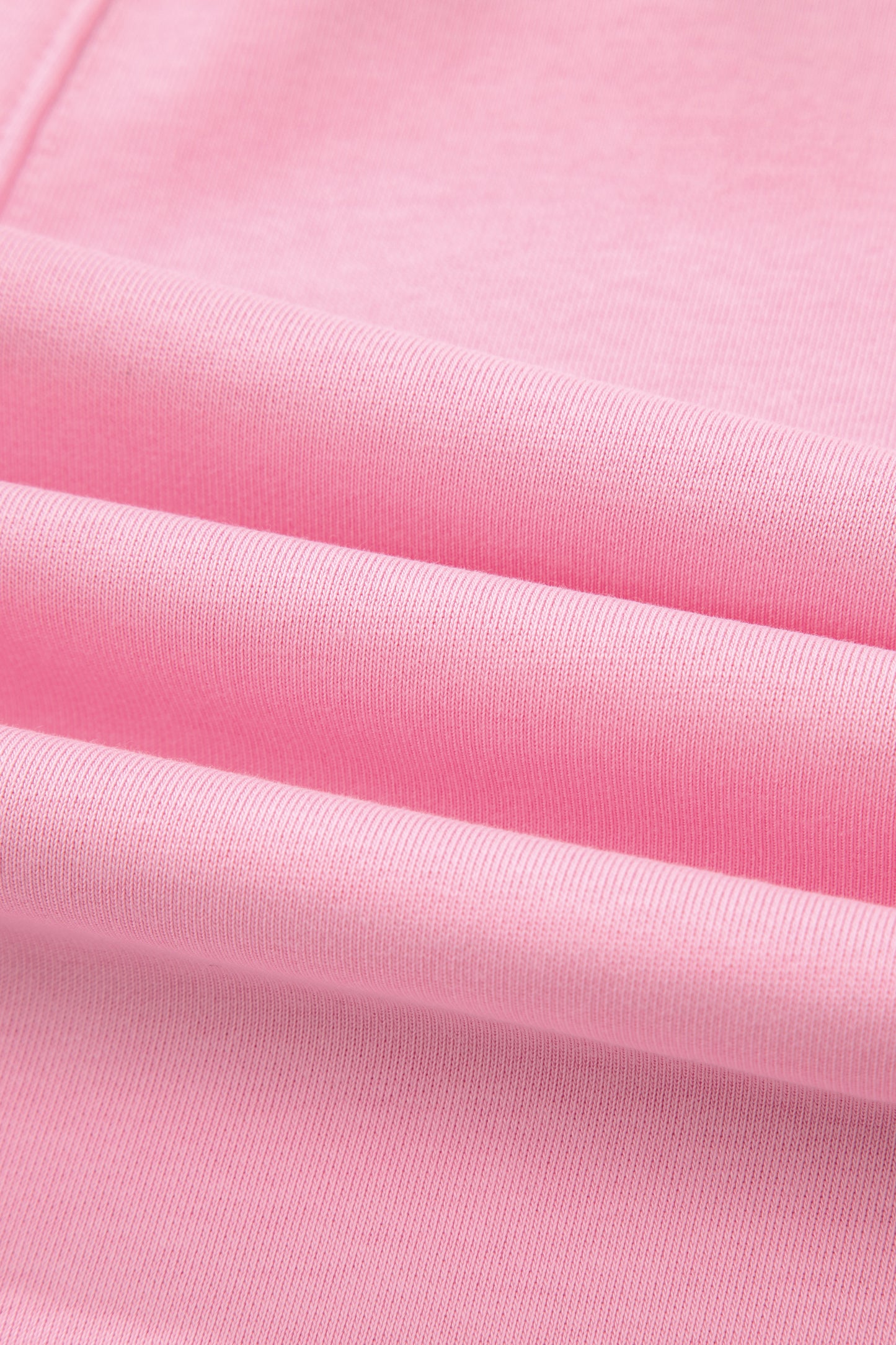 Mameluco suelto rosa de color sólido con bolsillo y dobladillo sin rematar de media manga