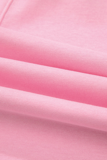 Mameluco suelto rosa de color sólido con bolsillo y dobladillo sin rematar de media manga
