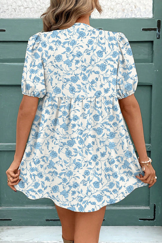 Minivestido azul cielo floral con lazo y mangas abullonadas en contraste