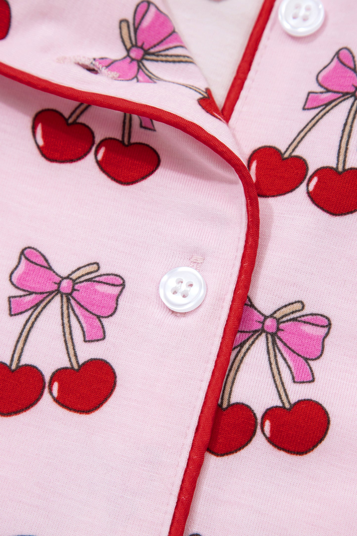 Pijama corto con estampado de cerezas/lazos rosas