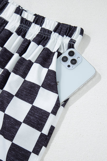Pantalones anchos de cintura alta con estampado a cuadros de dos tonos negros