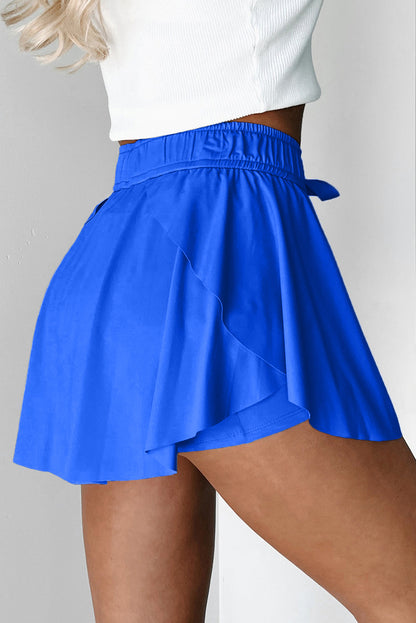 Faldas pantalón de tenis forradas, azul cielo, con cintura elástica con cordón
