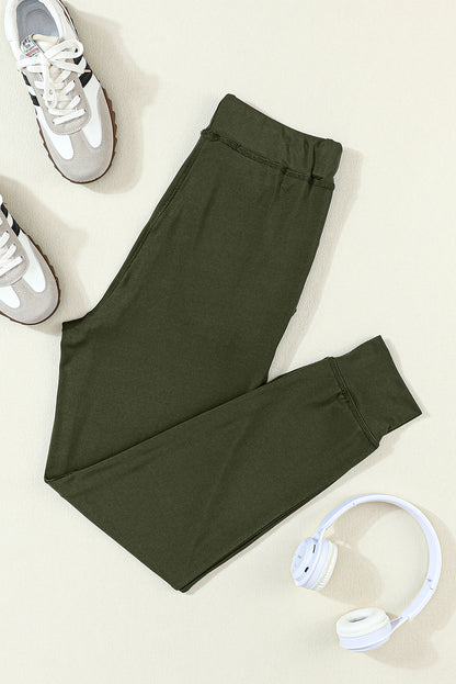Pantalón jogger con cordón, cintura elástica y bolsillos, color verde musgo
