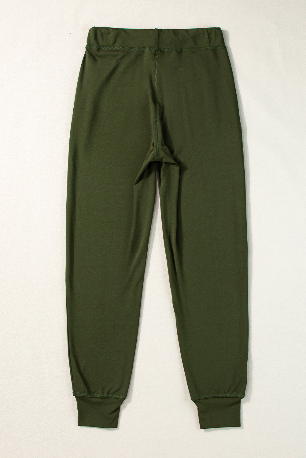 Pantalón jogger con cordón, cintura elástica y bolsillos, color verde musgo