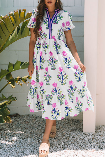 Vestido maxi blanco floral con mangas abullonadas cortas, escote en V y cintura alta