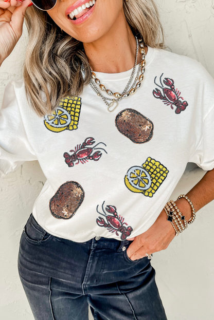 Camiseta blanca con cuello redondo, estampado de lentejuelas, cangrejo, patata, limón y maíz