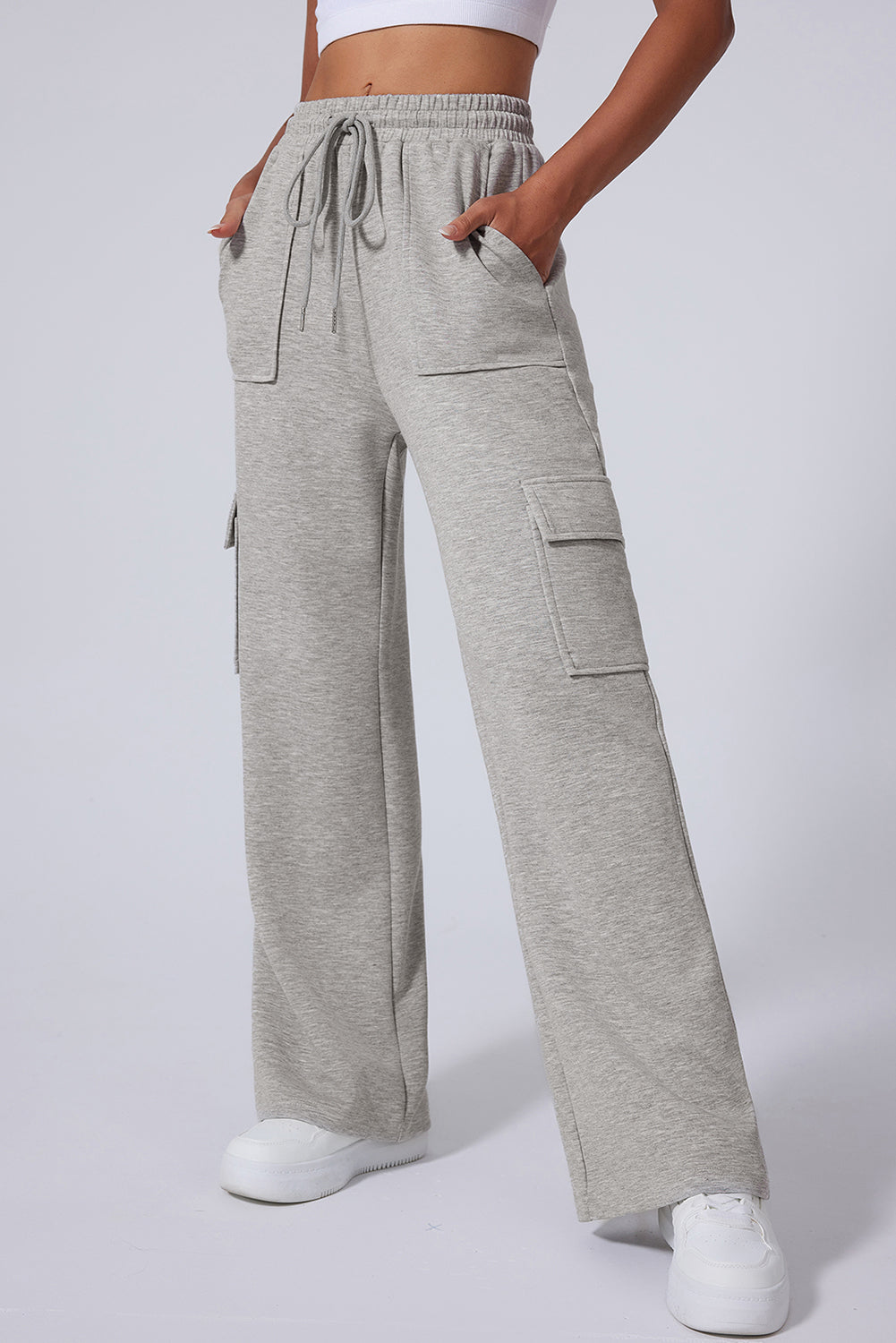 Pantalones de entrenamiento de pierna ancha, cintura alta con cordones y múltiples bolsillos, gris claro