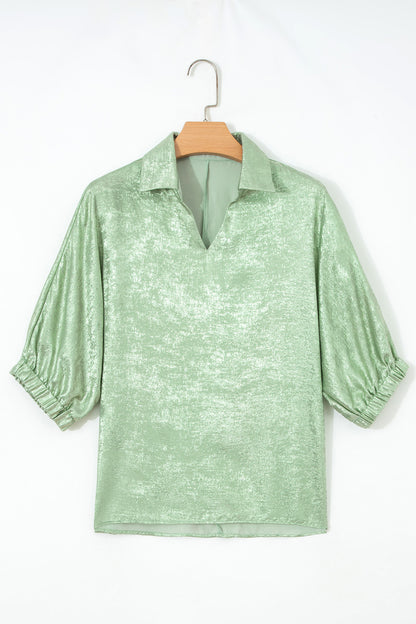 Top metálico de manga tres cuartos con cuello en V en color Aqua