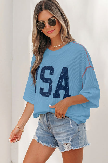 Top acanalado suelto de media manga con gráfico Beau Blue USA