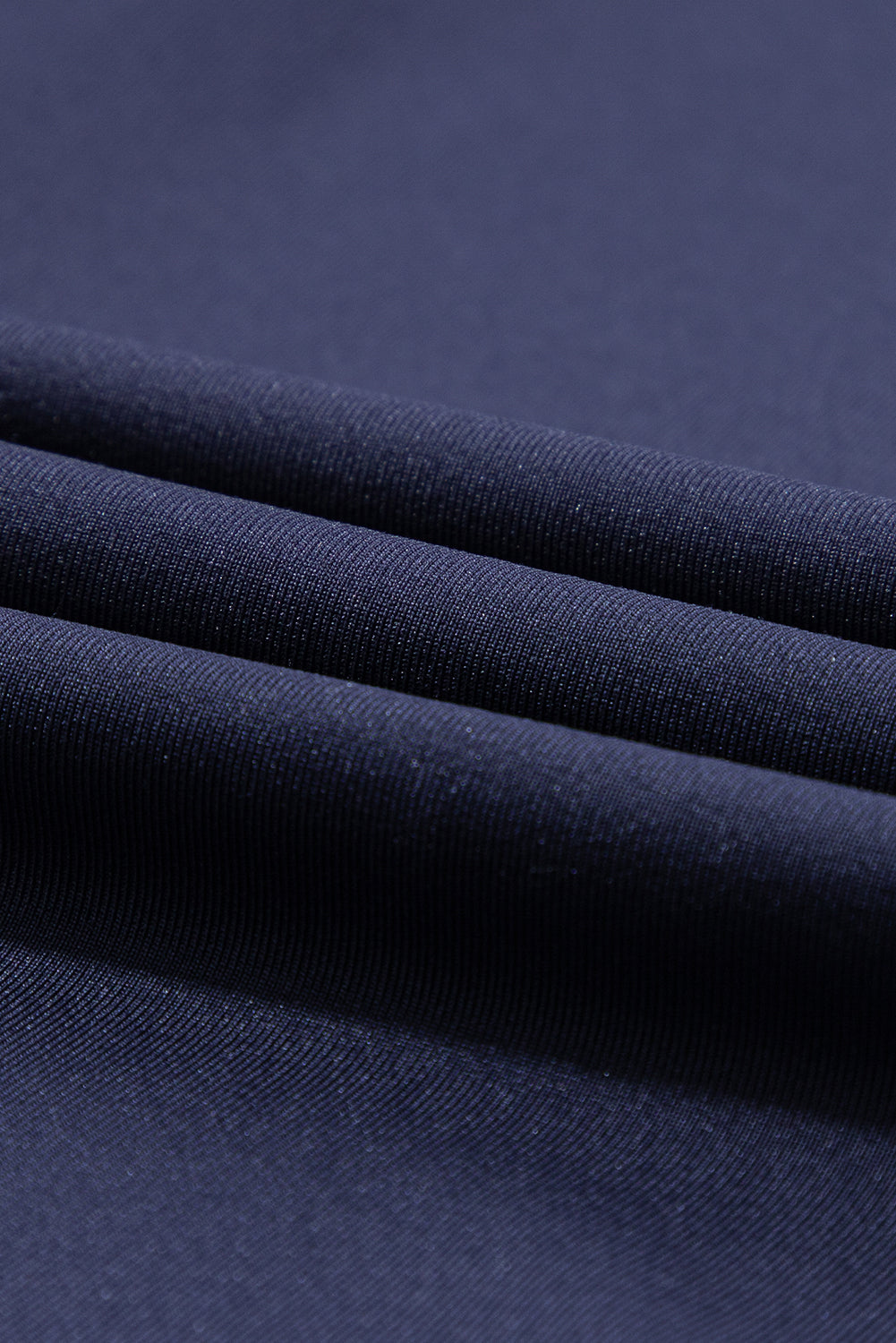 Pantalones deportivos azul marino con cordón ajustable en la cintura elástica y bolsillos