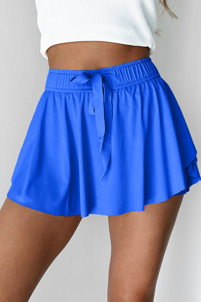 Faldas pantalón de tenis forradas, azul cielo, con cintura elástica con cordón