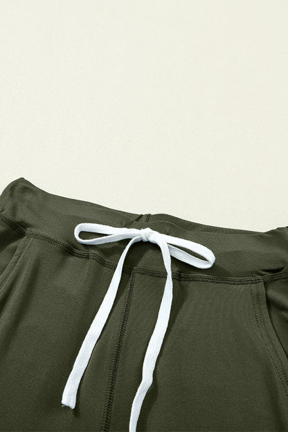 Pantalón jogger con cordón, cintura elástica y bolsillos, color verde musgo