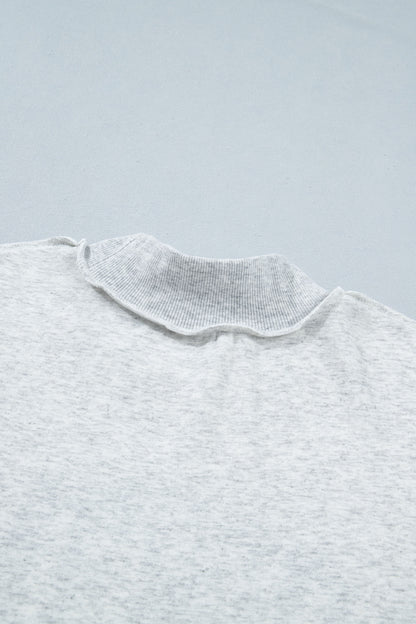 Sudadera gris claro con cuello simulado y gráfico reversible de EE. UU./América