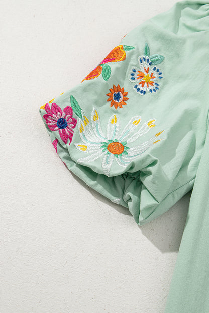 Blusa con mangas abullonadas y cuello dividido Clearly Aqua con bordado floral
