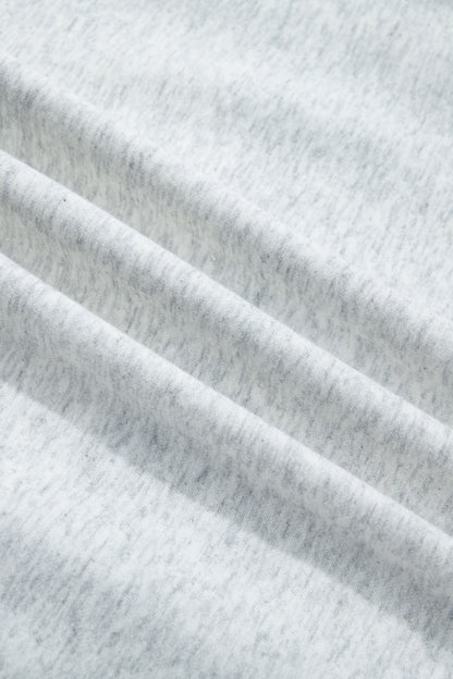 Sudadera gris claro con cuello simulado y gráfico reversible de EE. UU./América