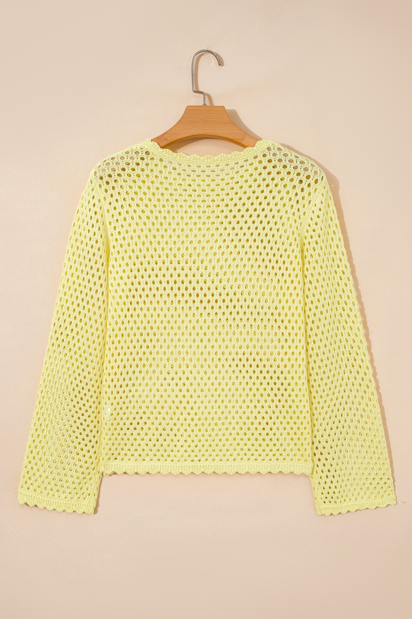 Blusa de punto calada de manga larga amarilla con ribete festoneado