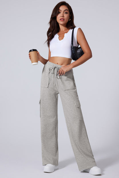 Pantalones de entrenamiento de pierna ancha, cintura alta con cordones y múltiples bolsillos, gris claro