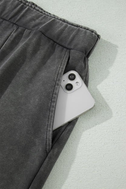 Pantalones de pernera ancha con estampado de leopardo y lavado mineral en gris oscuro de talla grande