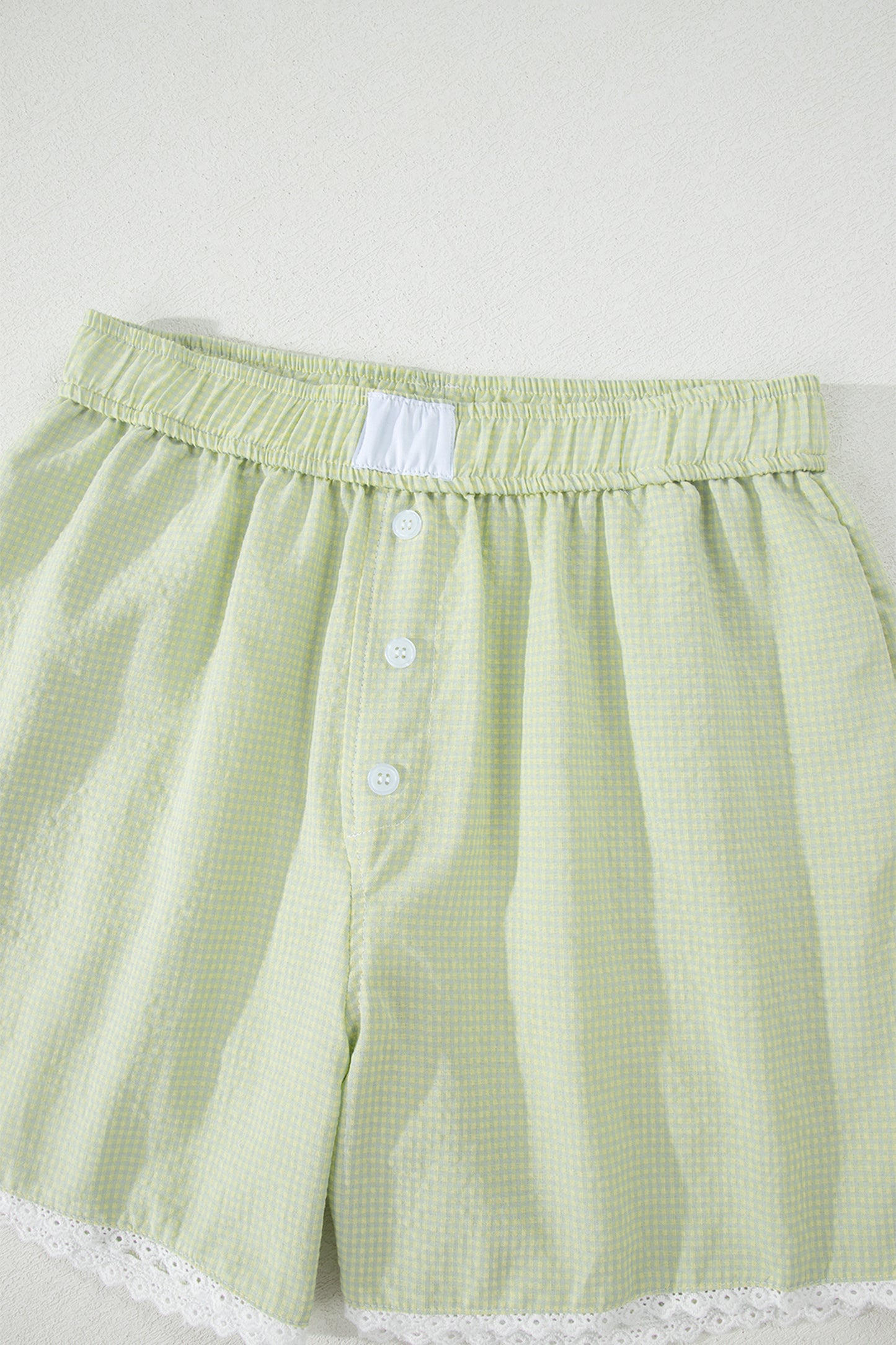 Shorts bóxer a cuadros vichy verdes con detalle de botones y ribete de encaje