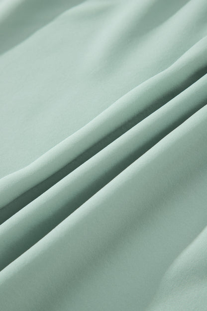 Vestido maxi escalonado de cintura alta con cuello en V y manga corta abullonada en color sólido Aqua claro