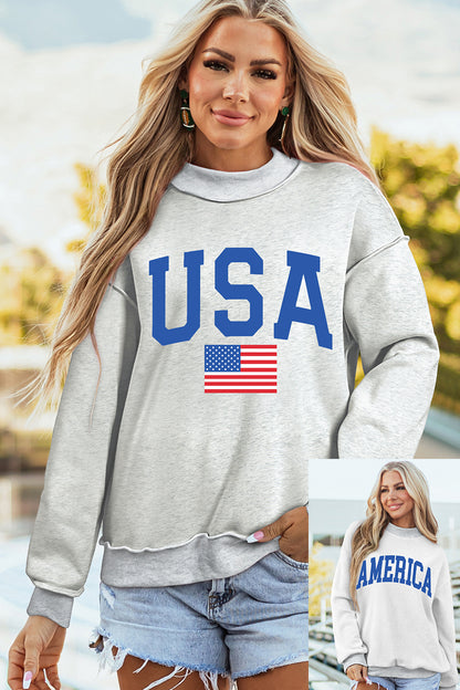 Sudadera gris claro con cuello simulado y gráfico reversible de EE. UU./América