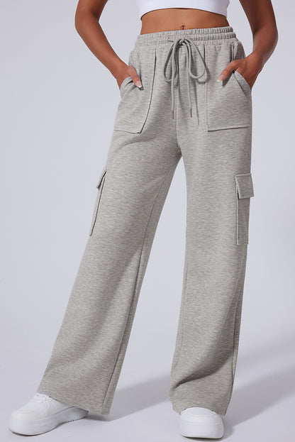 Pantalones de entrenamiento de pierna ancha, cintura alta con cordones y múltiples bolsillos, gris claro