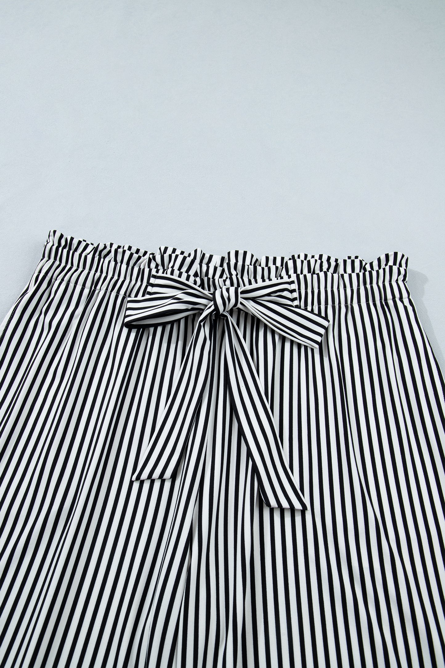 Pantalones casuales rectos holgados de talla grande con rayas negras