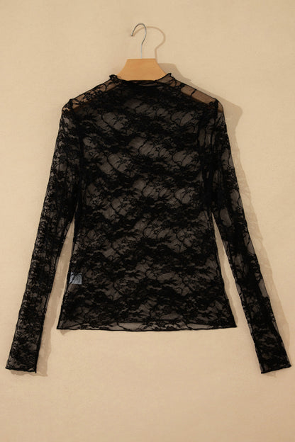 Top de manga larga de encaje floral semitransparente negro con cuello simulado y dobladillo ondulado