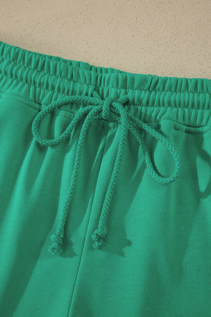 Conjunto de 2 piezas de camiseta holgada y pantalones cortos con cordón en verde mar liso