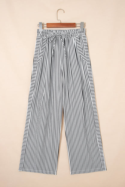 Pantalones casuales negros de pernera ancha con raya