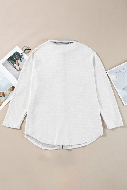 Chaqueta relajada gris con solapas y bolsillos en contraste