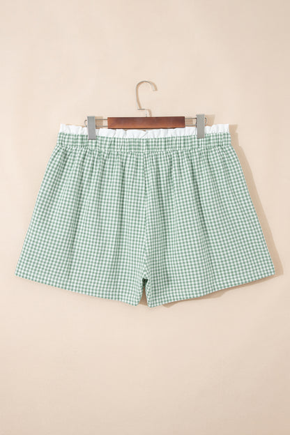 Pantalones cortos de talla grande con estampado de cuadros y ribete verde en contraste