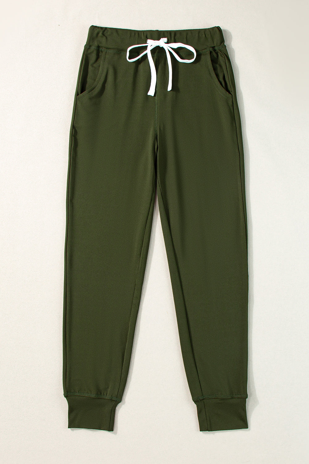 Pantalón jogger con cordón, cintura elástica y bolsillos, color verde musgo