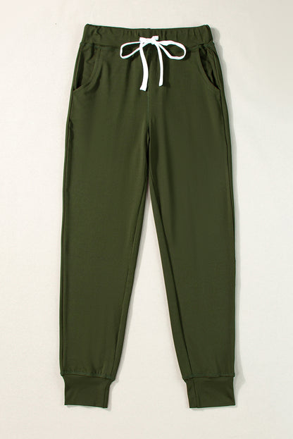 Pantalón jogger con cordón, cintura elástica y bolsillos, color verde musgo