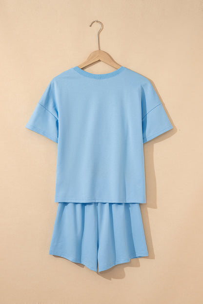 Conjunto de camiseta Myosotis con cuello en V y hombros caídos, y shorts con cintura elástica y cordón de retazos