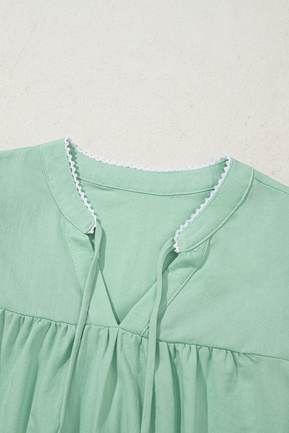 Blusa con mangas abullonadas y cuello dividido Clearly Aqua con bordado floral