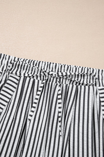 Pantalones casuales negros de pernera ancha con raya