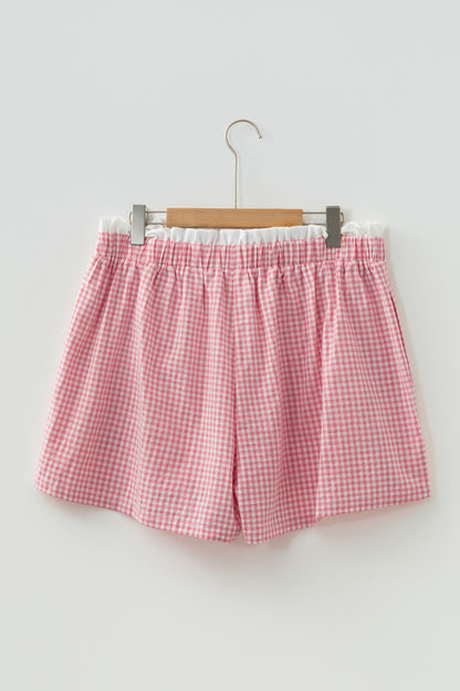 Pantalones cortos de talla grande con estampado de cuadros y ribete rosa en contraste