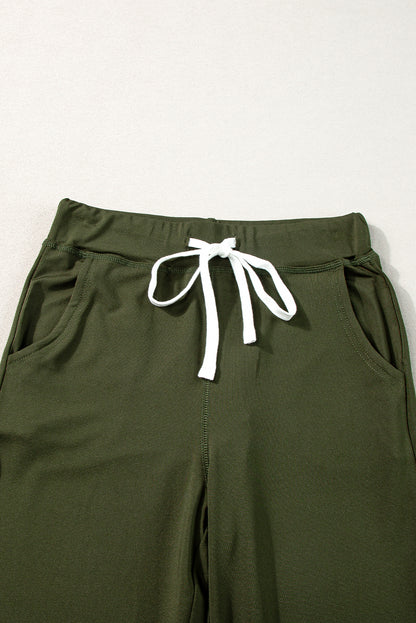 Pantalón jogger con cordón, cintura elástica y bolsillos, color verde musgo