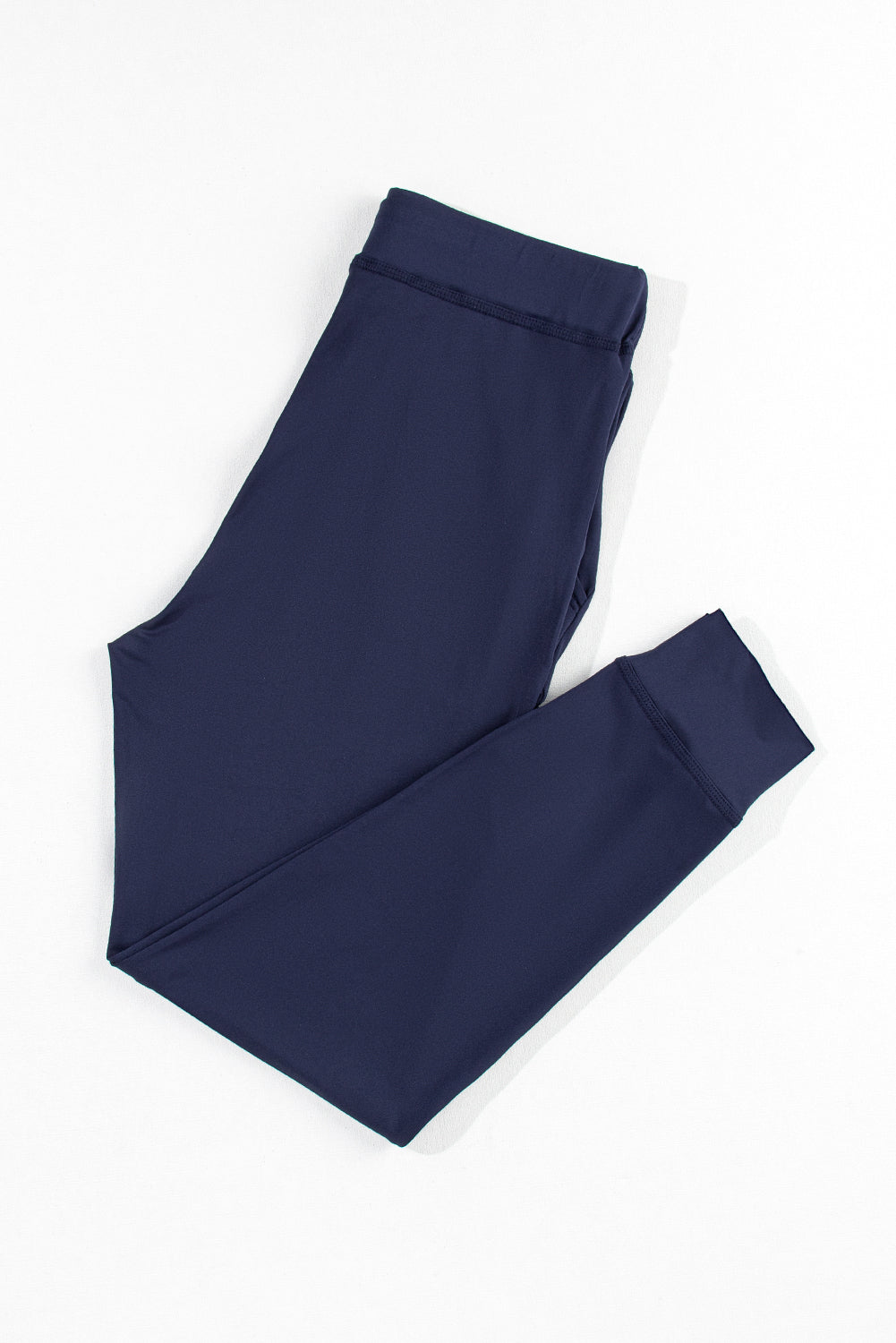 Pantalones deportivos azul marino con cordón ajustable en la cintura elástica y bolsillos